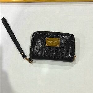 Michael Kors Black Wristlet with Gold Accent